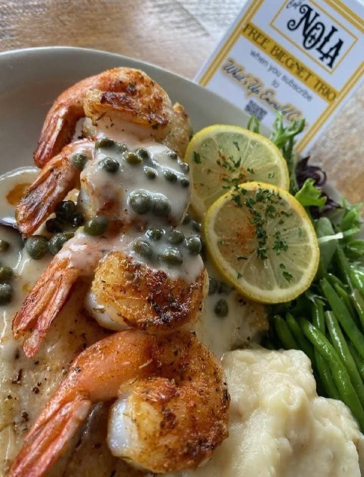 Shrimp with a creamy sauce, lemon and green beans, shared by Café Nola